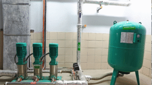 Industrial chemical dosing pumps used to inject alkalinity booster into a water treatment system