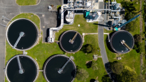 Aerial view of a wastewater treatment plant performing heavy metals removal in industrial clarifiers
