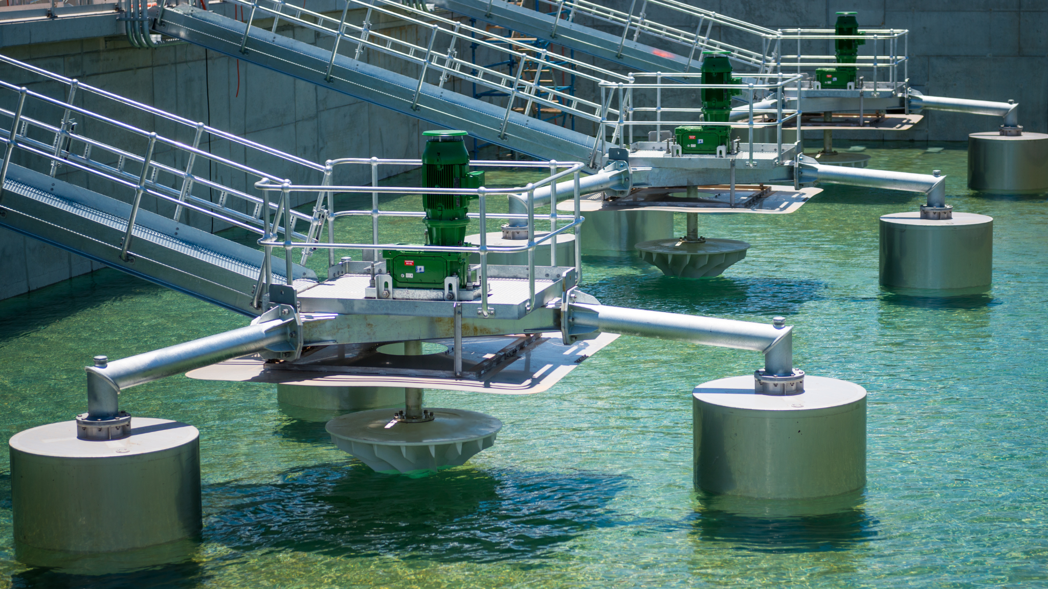 Close-up of an industrial wastewater clarifier system used for metal precipitation and solids removal