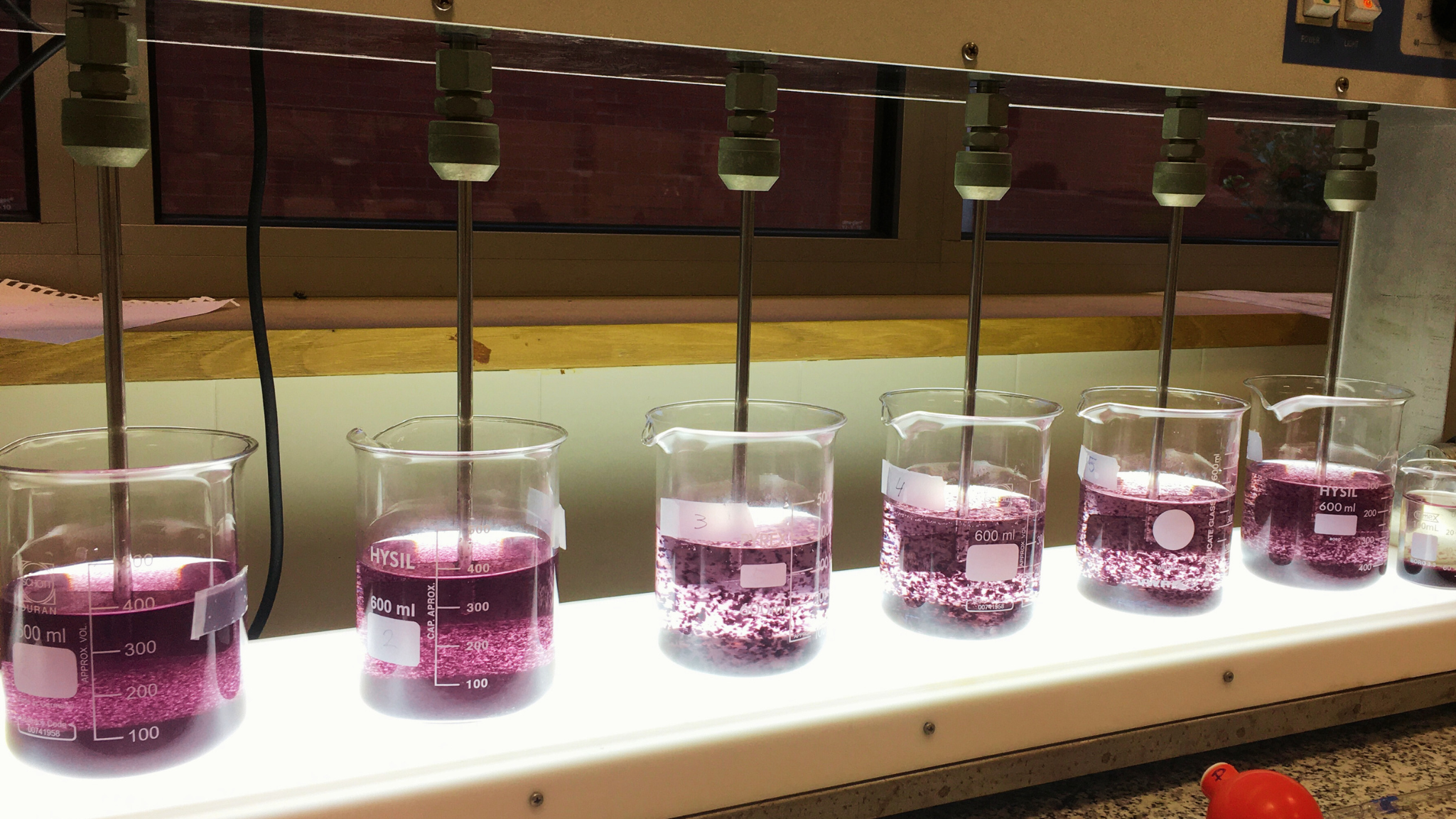 Jar test experiment demonstrating advanced coagulation methods for industrial wastewater treatment in a laboratory setup