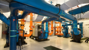 Industrial glycol systems with scale inhibitor treatment to prevent scale build up and improve performance