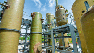 Industrial chemical blending tanks used in water treatment facility.