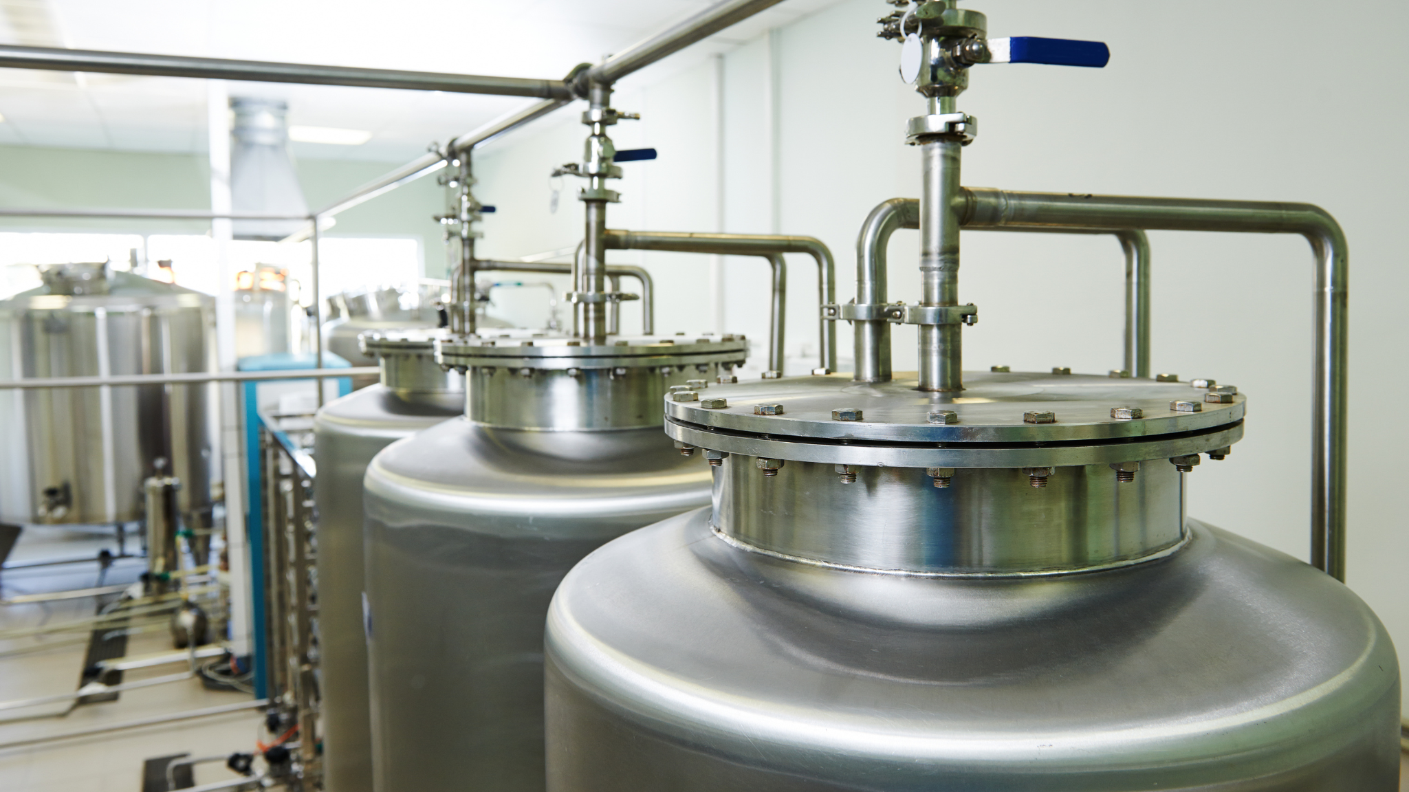 Industrial water system with stainless steel tanks for chemistry-first legionella prevention.