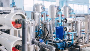 Industrial water treatment system using filtration, pumps, and membranes for chemical treatment for water and scale prevention