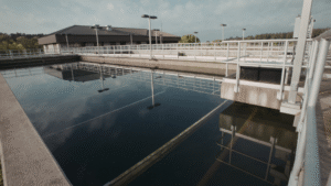 Wastewater clarifier showing clear effluent after using a polymer flocculant for wastewater treatment.
