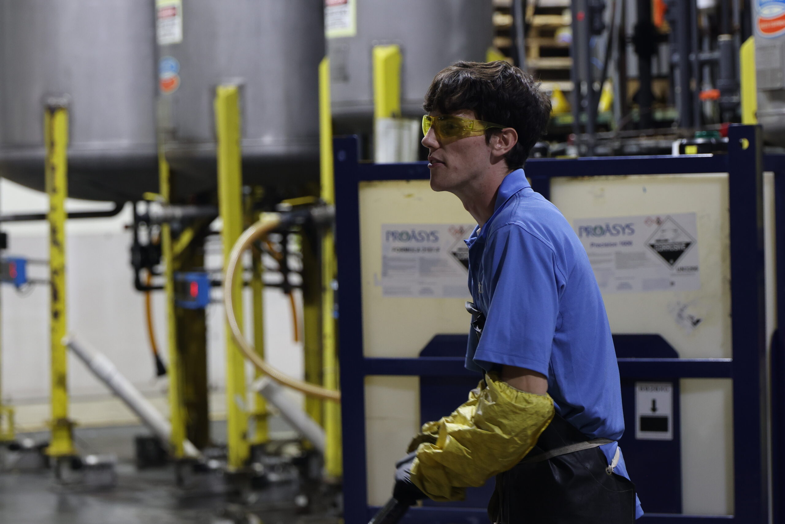 Technician overseeing chlorine dioxide water treatment system at an industrial facility