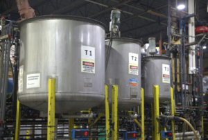 Chemical blending tanks used in industrial water treatment manufacturing