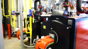 Industrial boiler system illustrating condensate treatment in steam systems