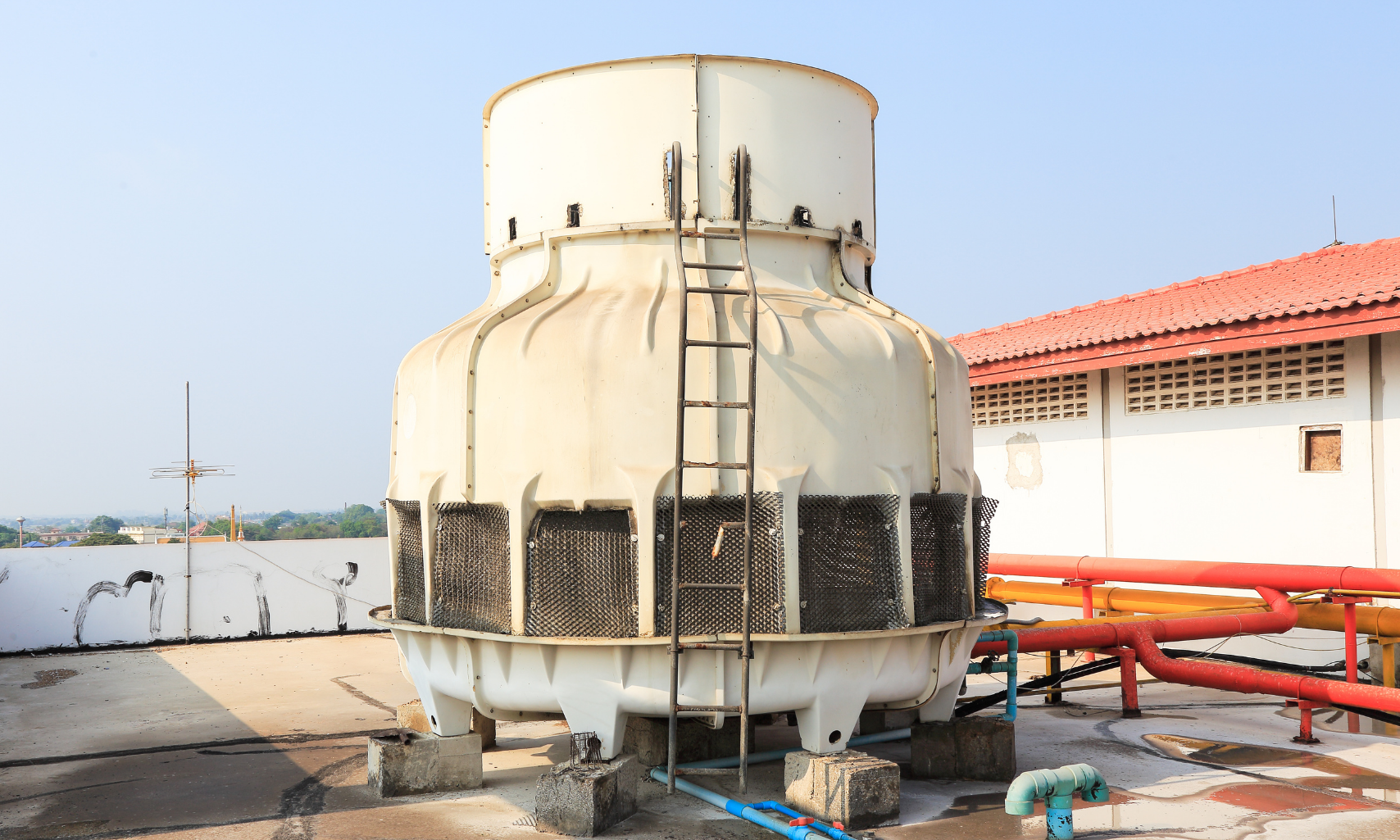Cooling tower system where cycles of concentration are managed through evaporation and blowdown.