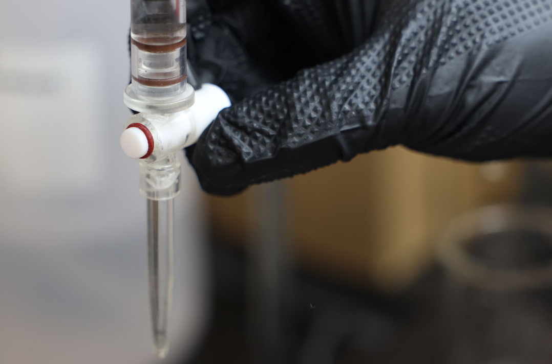 Close-up of chemical dosing equipment used in water treatment systems to control disinfectant application.