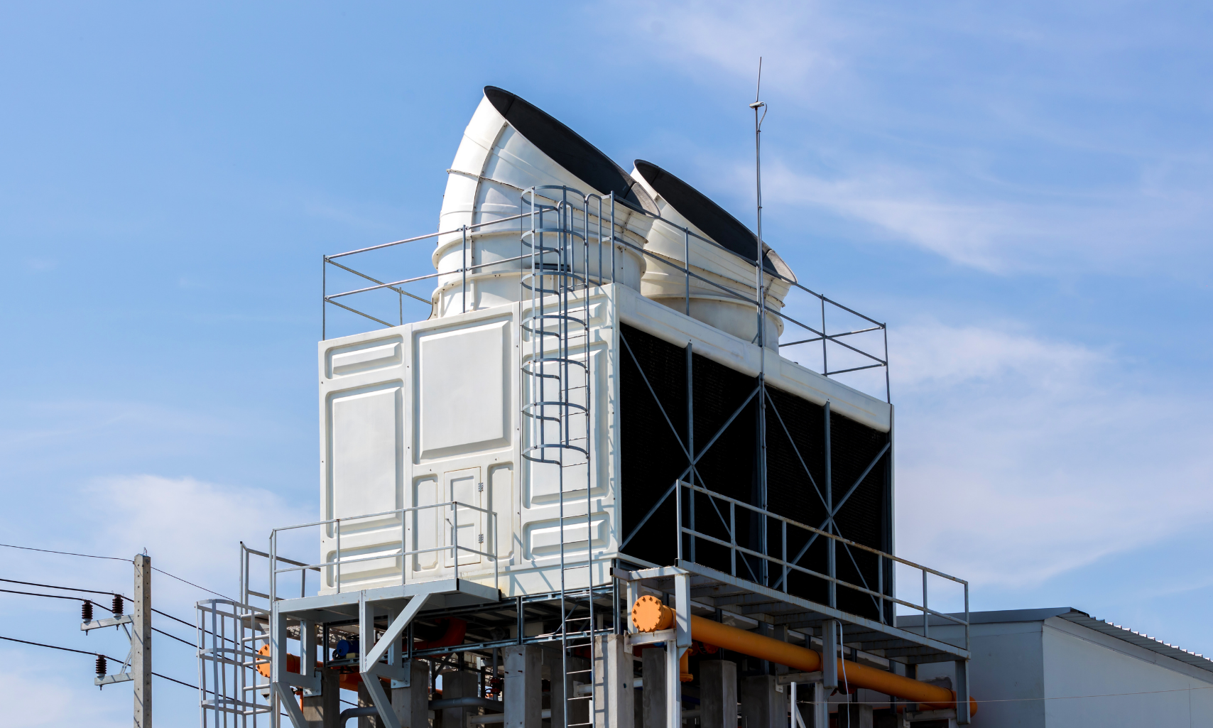 Industrial cooling tower systems where copper corrosion inhibitors are commonly applied to protect heat transfer surfaces and piping.