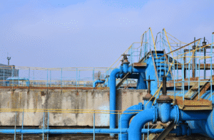 Industrial water treatment system with large piping and treatment infrastructure