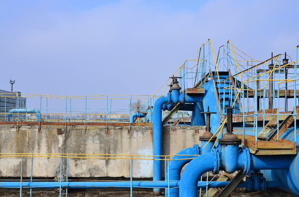 Industrial water treatment system with large piping and treatment infrastructure