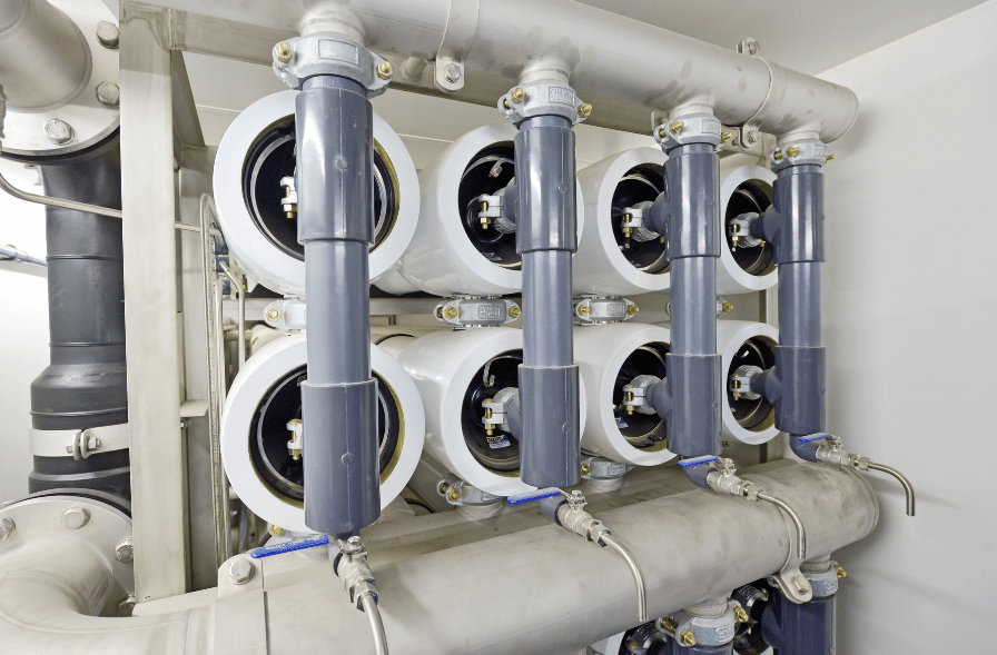 Industrial membrane system with horizontal pressure vessels and connected piping.